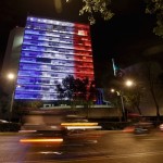 Senate building is lit up in blue, white and red, the colors of the French flag, following the Paris terror attacks, in Mexico City