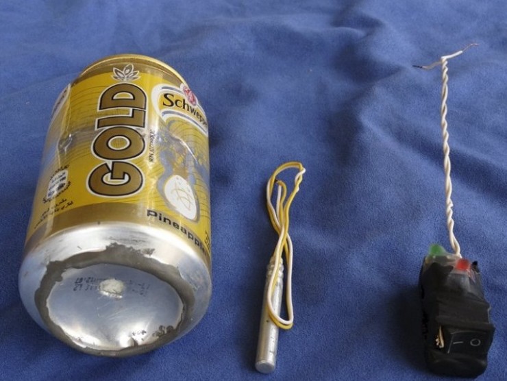 A photo published in Islamic State magazine Dabiq shows a can of Schweppes Gold soft drink and what appeared to be a detonator and switch on a blue background