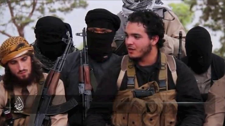 Still image taken from video shows an Islamic State militant who identifies himself as Abu Salman speaking at an undisclosed location