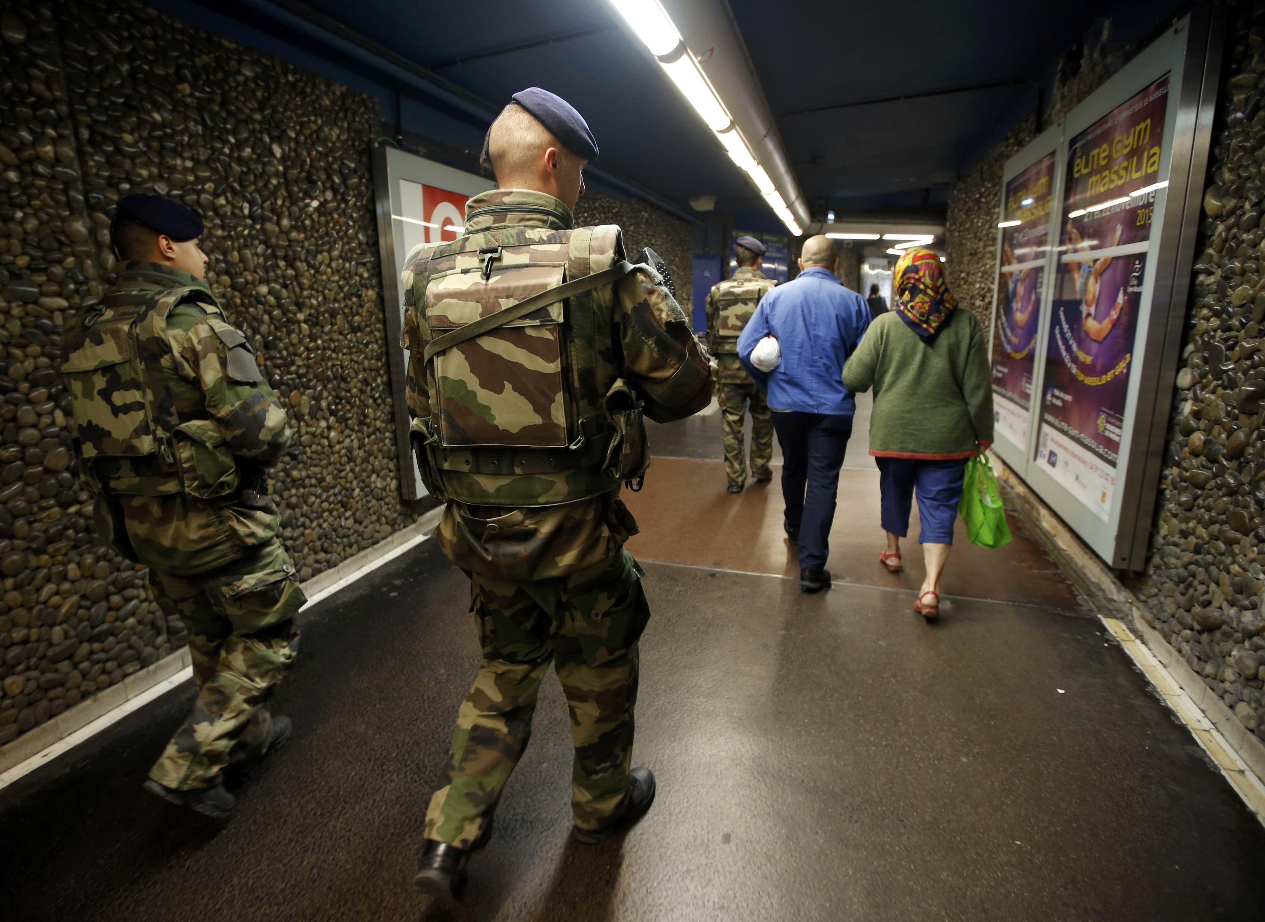 French soldiers patrol in the subway in Marseille following the series of deadly attacks in Paris
