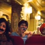 Ramesh Parekh and family watch contestants at the 2015 Just For Men National Beard & Moustache Championships at the Kings Theater in the Brooklyn borough of New York