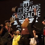 Scott Metts from Orlando, Florida, celebrates after winning the 2015 Just For Men National Beard & Moustache Championships at the Kings Theater in the Brooklyn borough of New York
