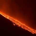 Italy's Mount Etna, Europe's tallest and most active volcano, spews lava as it erupts on the southern island of Sicily