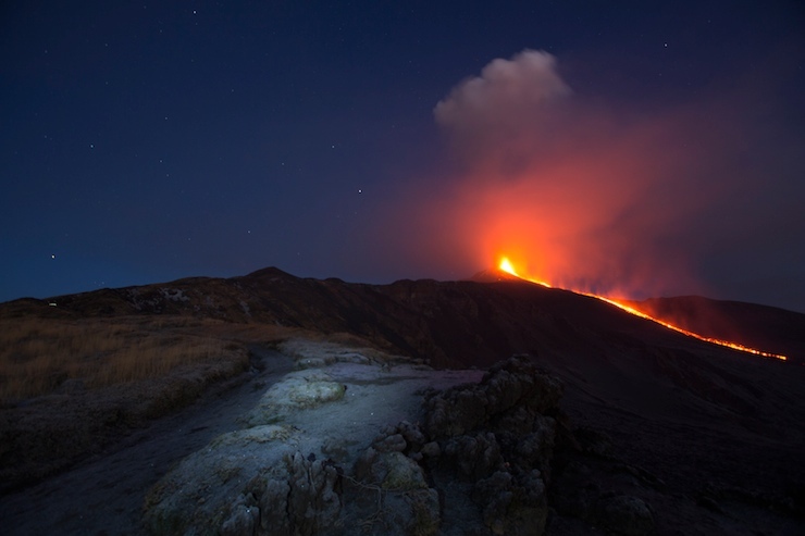 Italy's Mount Etna, Europe's tallest and most active volcano, spews lava as it erupts on the southern island of Sicily