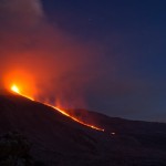 Italy's Mount Etna, Europe's tallest and most active volcano, spews lava as it erupts on the southern island of Sicily