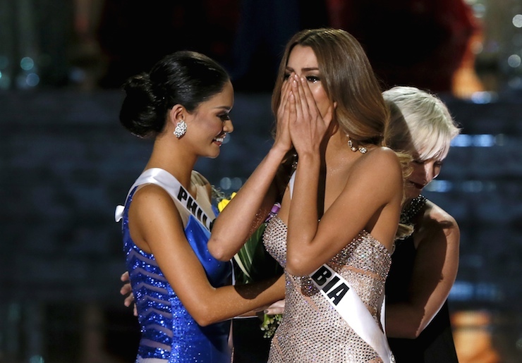 Miss Colombia Gutierrez reacts next to Miss Philippines Wurtzbach when she was originally announced as the winner during the 2015 Miss Universe Pageant in Las Vegas