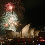 Fireworks explode over the Sydney Opera House in a 9pm display before the midnight fireworks which will usher in the new year in Australia's largest city