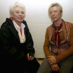 File photo of British singer David Bowie sitting with Deborah Harry in Manchester