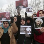 Muslim Americans protest against the execution of Shi'ite Muslim cleric Nimr al-Nimr in Saudi Arabia, during a rally in Dearborn