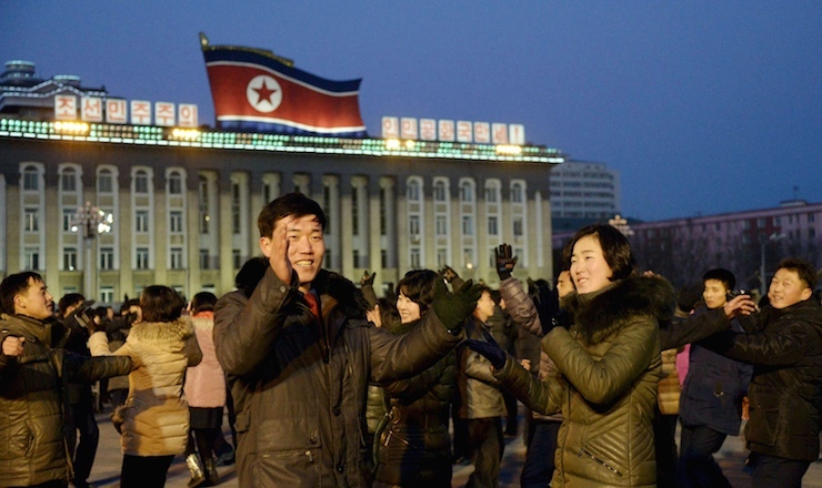North Koreans dance to celebrate what the country claims was a "successful hydrogen bomb" test at Kim Il Sung square in Pyongyang, North Korea, in this photo released by Kyodo January 8, 2016. South Korea unleashed a high-decibel propaganda barrage across its border with North Korea on Friday in retaliation for its nuclear test, while the United States called on China to end "business as usual" with its ally. Mandatory credit REUTERS/Kyodo ATTENTION EDITORS - FOR EDITORIAL USE ONLY. NOT FOR SALE FOR MARKETING OR ADVERTISING CAMPAIGNS. THIS IMAGE HAS BEEN SUPPLIED BY A THIRD PARTY. IT IS DISTRIBUTED, EXACTLY AS RECEIVED BY REUTERS, AS A SERVICE TO CLIENTS. MANDATORY CREDIT. JAPAN OUT. NO COMMERCIAL OR EDITORIAL SALES IN JAPAN. TPX IMAGES OF THE DAY