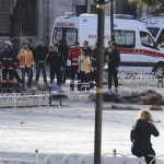 Rescue teams gather at the scene after an explosion in central Istanbul