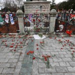 German football club scarves and red carnations are placed at the Obelisk of Theodosius at Sultanahmet square in Istanbul