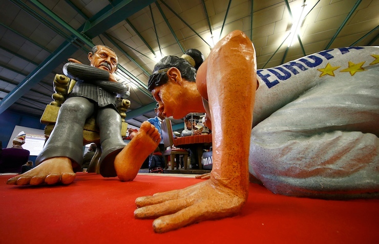 A papier mache caricature figure for a carnival float of Turkish President Tayyip Erdogan (L) is prepared for the upcoming Rose Monday carnival parade in Mainz, Germany February 2, 2016. REUTERS/Kai Pfaffenbach