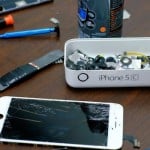 Pieces of an iPhone are seen in a repair store in New York