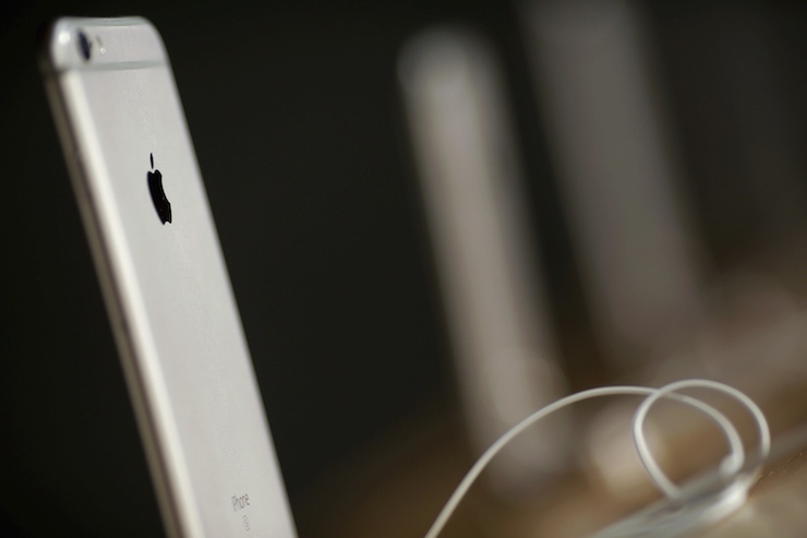 Apple iPhones are displayed at an Apple store in Beijing