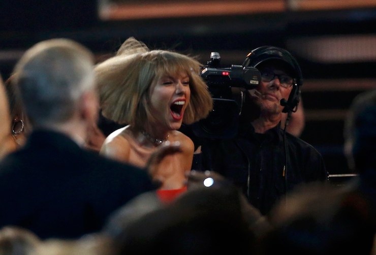 Taylor Swift reacts after hearing Ed Sheeran won Song of the Year at the 58th Grammy Awards in Los Angeles