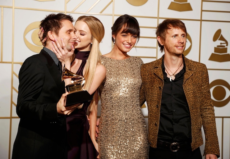 Matt Bellamy and Dominic Howard of Muse pose with their award during the 58th Grammy Awards in Los Angeles