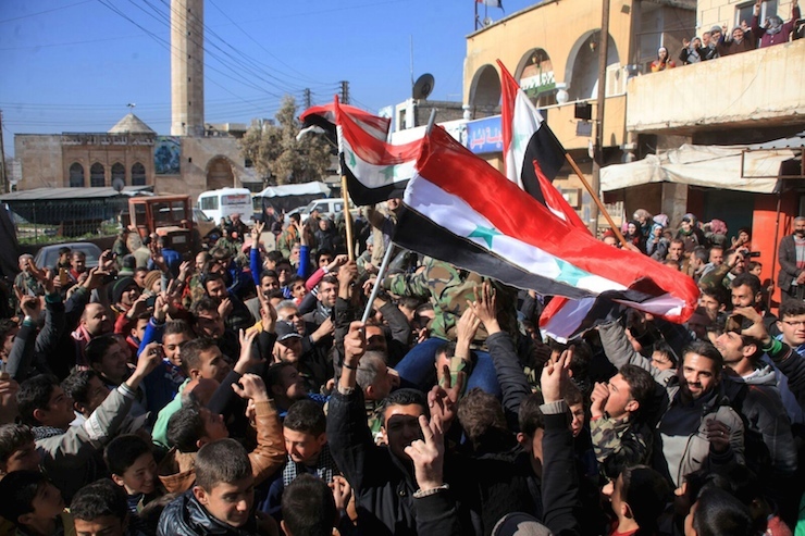 Residents of Nubul and al-Zahraa, along with forces loyal to Syria's President Bashar al-Assad, celebrate in Nubul, northern Aleppo countryside, Syria, after the siege of their towns was broken, in this handout picture provided by SANA on February 4, 2016. REUTERS/SANA/Handout via Reuters ATTENTION EDITORS - THIS PICTURE WAS PROVIDED BY A THIRD PARTY. REUTERS IS UNABLE TO INDEPENDENTLY VERIFY THE AUTHENTICITY, CONTENT, LOCATION OR DATE OF THIS IMAGE. FOR EDITORIAL USE ONLY. NOT FOR SALE FOR MARKETING OR ADVERTISING CAMPAIGNS. THIS PICTURE IS DISTRIBUTED EXACTLY AS RECEIVED BY REUTERS, AS A SERVICE TO CLIENTS TPX IMAGES OF THE DAY