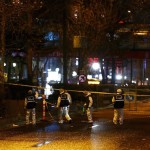 Forensic officers work on the site of a suicide bomb attack in Ankara