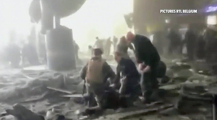 ATTENTION EDITORS - VISUAL COVERAGE OF SCENES OF INJURY OR DEATH Rescue workers treat victims at the airport, in this image taken from television video, after a blast in Brussels, Belgium, March 22, 2016. REUTERS/RTL Belgium via Reuters TV ATTENTION EDITORS - THIS IMAGE HAS BEEN SUPPLIED BY A THIRD PARTY. FOR EDITORIAL USE ONLY. NOT FOR SALE FOR MARKETING OR ADVERTISING CAMPAIGNS. FOR EDITORIAL USE ONLY. NO RESALES. NO ARCHIVE. BELGIUM OUT. NO COMMERCIAL OR EDITORIAL SALES IN BELGIUM. THIS PICTURE IS DISTRIBUTED EXACTLY AS RECEIVED BY REUTERS, AS A SERVICE TO CLIENTS. TEMPLATE OUT