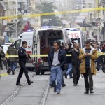 Police secure the area following a suicide bombing in central Istanbul