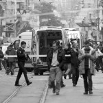 Police secure the area following a suicide bombing in central Istanbul