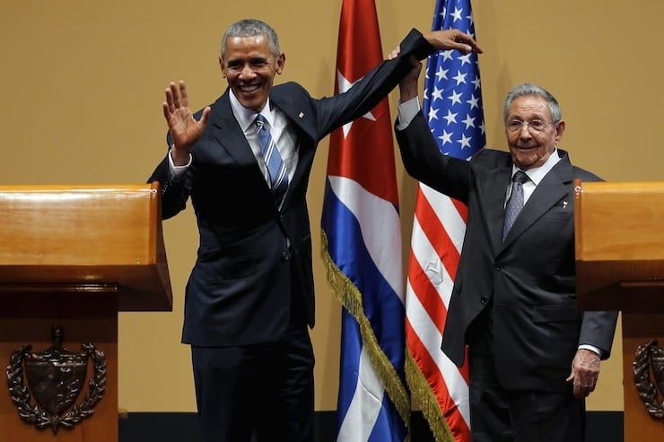 U.S. President Barack Obama and Cuban President Raul Castro gesture after a news conference as part of Obama's three-day visit to Cuba, in Havana
