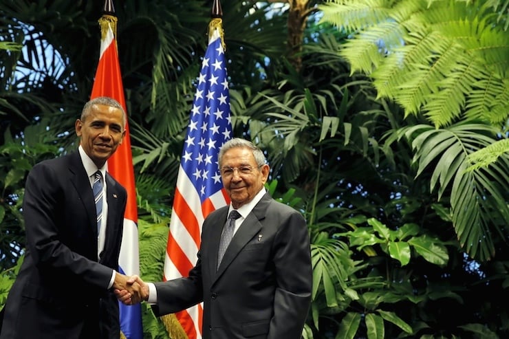 U.S. President Barack Obama and Cuba's President Raul Castro shake hands during a meeting on the second day of Obama's visit to Cuba, in Havana
