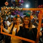 Women wear flowers in their hair during the annual carnival celebration of the start of the spring season in Adana city