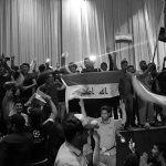 Followers of Iraq's Shi'ite cleric Moqtada al-Sadr are seen in the parliament building as they storm Baghdad's Green Zone after lawmakers failed to convene for a vote on overhauling the government, in Iraq