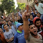 Egyptian protesters and Muslim Brotherhood members shout slogans against President Abdel Fattah al-Sisi and government during a demonstration protesting the government's decision to transfer two Red Sea islands to Saudi Arabia, in front of the Press Syndic