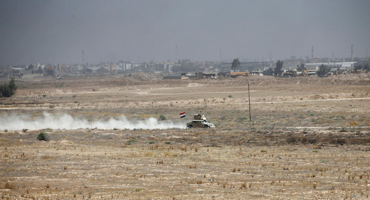 An Iraqi army vehicle is seen in Falluja, Iraq, June 17, 2016. REUTERS/Thaier Al-Sudani
