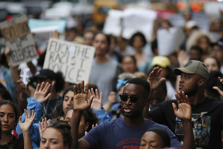 People take part in a protest against the killing of Alton Sterling, Philando Castile and in support of Black Lives Matter during a march along Manhattan's streets in New York July 8, 2016. REUTERS/Eduardo Munoz TEMPLATE OUT.