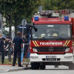 Members of the fire brigade attend scene near shooting rampage at Olympia shopping mall in Munich