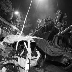 People surround a Turkish army tank in Ankara