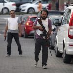 A plain clothes policeman patrols a street in the resort town of Marmaris