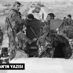 A convoy of Kurdish People's Protection Units (YPG) fighters enter the village of Tel Khanzir, after they took control of the area from Islamic State fighters, in the western countryside of Ras al-Ain