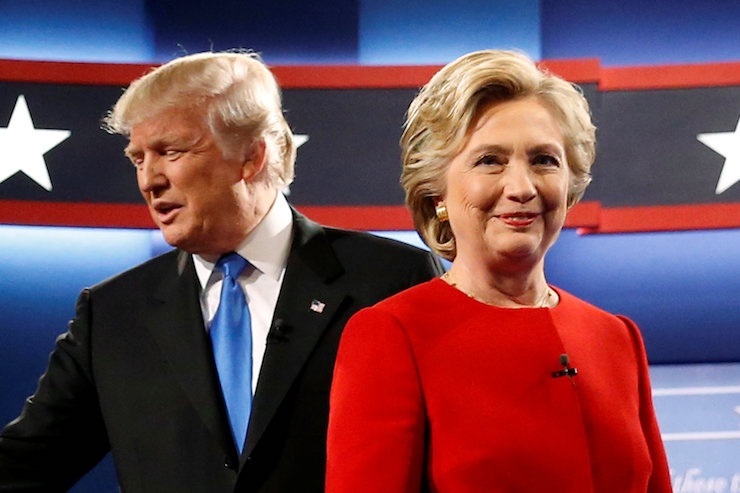 Republican U.S. presidential nominee Donald Trump and Democratic U.S. presidential nominee Hillary Clinton greet one another as they take the stage for their first debate at Hofstra University in Hempstead, New York, U.S. September 26, 2016. REUTERS/Jonathan Ernst