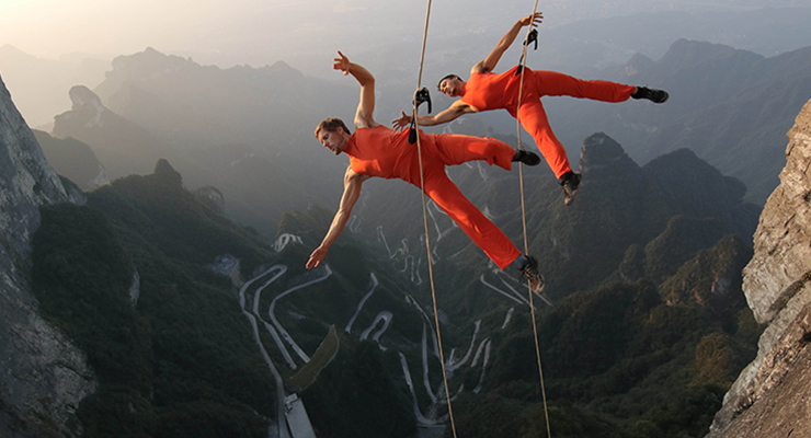 A dance group performs on the cliffs in Zhangjiajie