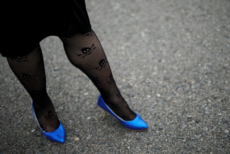 Man wearing high-heeled shoes takes part in the lesbian, gay, bisexual and transgender (LGBT) pride parade in Taipei