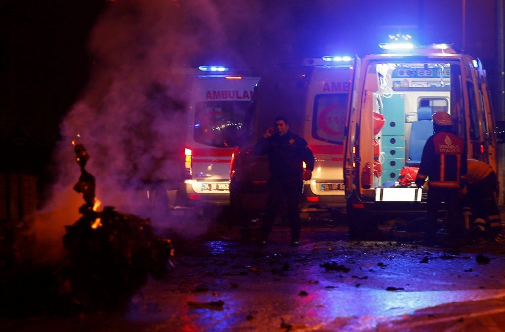 Police and ambulances arrive the scene after a blast in Istanbul