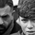 Boy cries at the funeral of Arik, a victim of an attack by a gunman at Reina nightclub, in Istanbul
