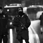 Police secure an area near an Istanbul nightclub, following a gun attack