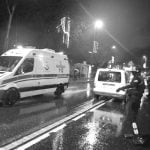 An ambulance arrives near a nightclub where a gun attack took place during a New Year party in Istanbul