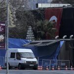 Minibus is parked outside the entrance of Reina nightclub by the Bosphorus, which was attacked by a gunman, in Istanbul