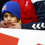 Boy reacts at the funeral of Arik, a victim of an attack by a gunman at Reina nightclub, in Istanbul