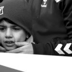 Boy reacts at the funeral of Arik, a victim of an attack by a gunman at Reina nightclub, in Istanbul