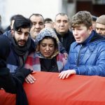Relatives react at the funeral of Arik, a victim of an attack by a gunman at Reina nightclub, in Istanbul