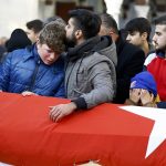 Relatives react at the funeral of Arik, a victim of an attack by a gunman at Reina nightclub, in Istanbul