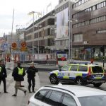 Police officers guard at the downtown in Stockholm